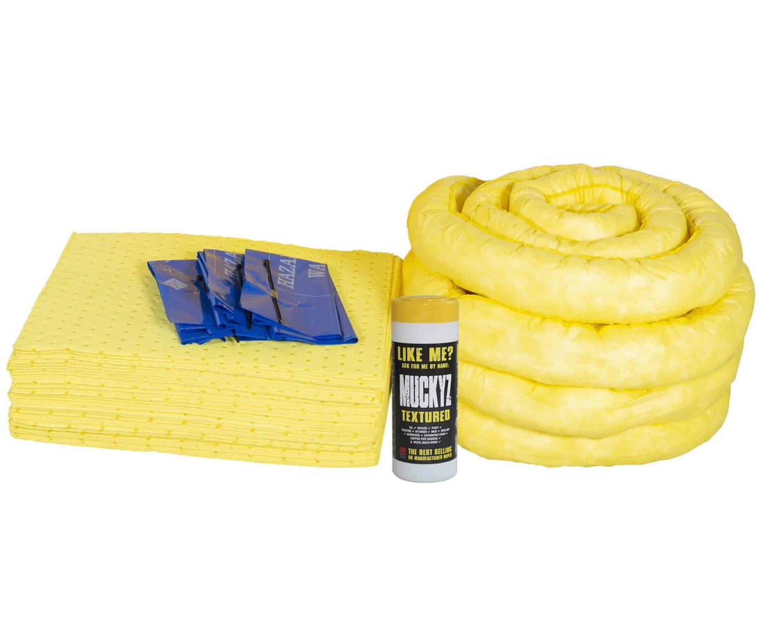 Spill kit with yellow bucket, absorbent pads, and other components on a white background